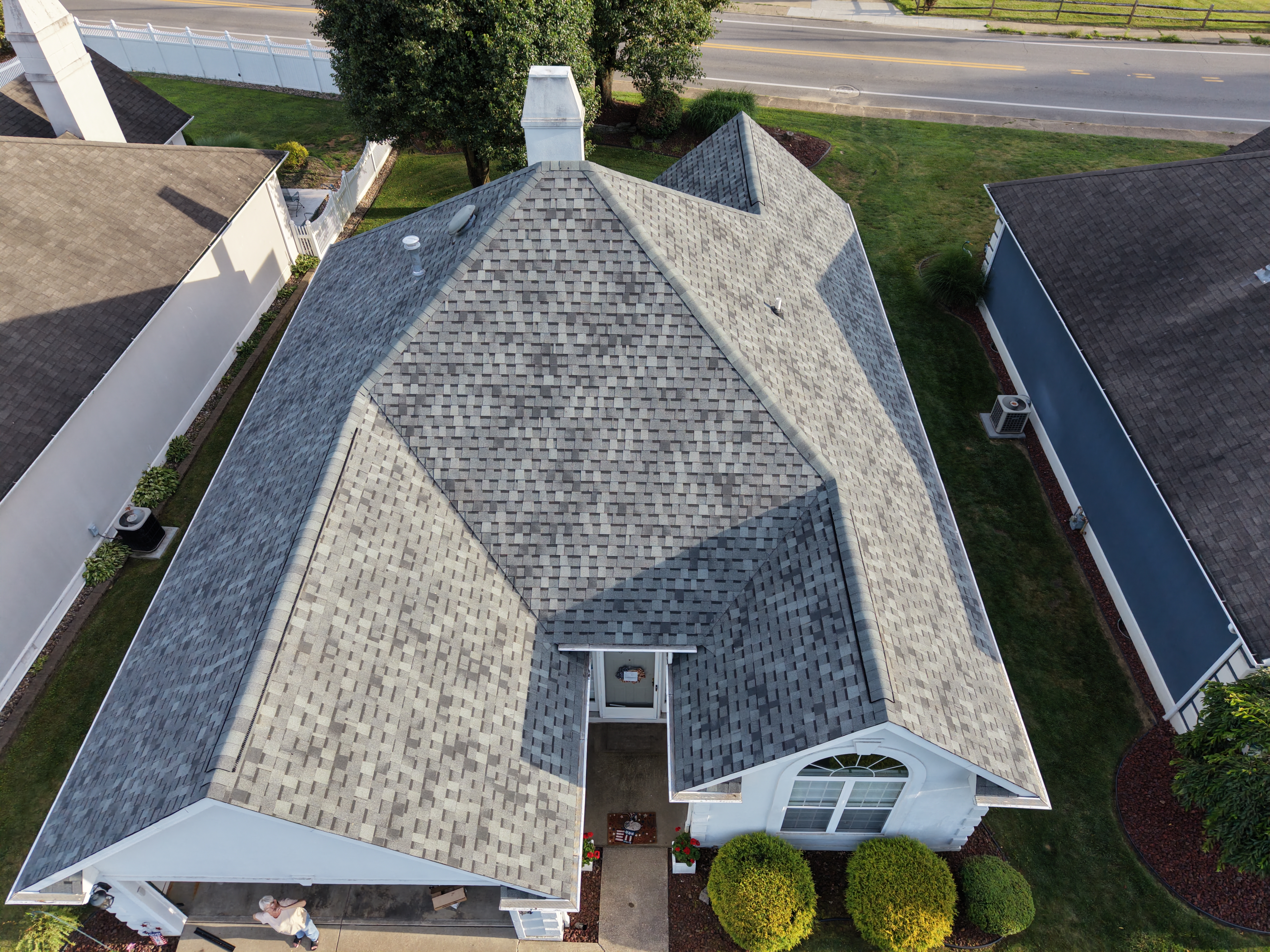 Aerial view of a completed architectural shingle roof on a Mid-Ohio Valley home